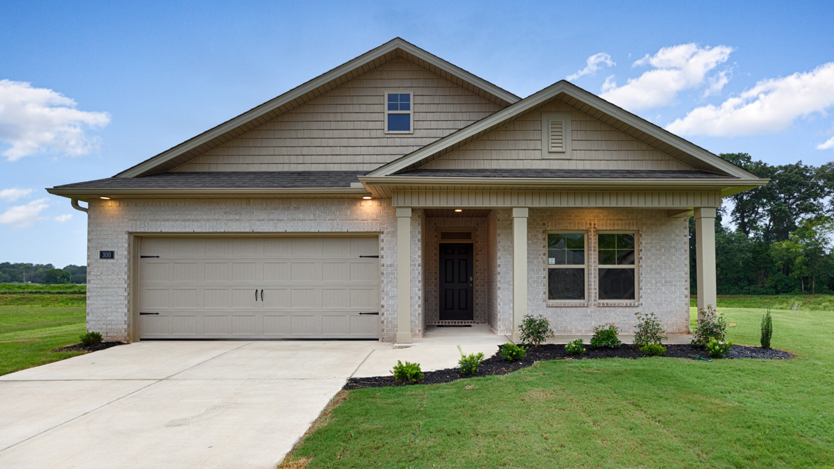 Single story home with brick and two car garage