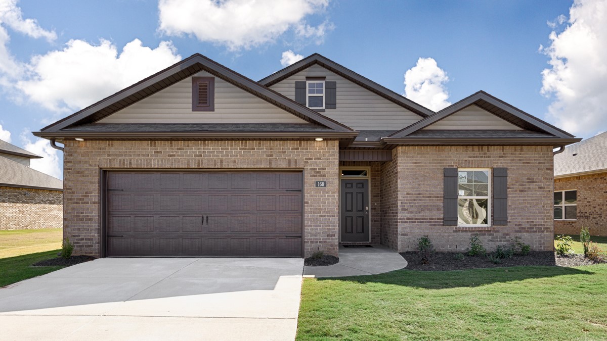 Single story home with brick and two car garage