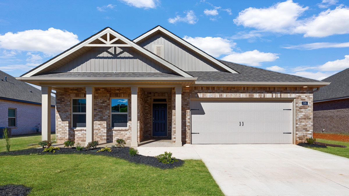 Single story home with brick and two car garage