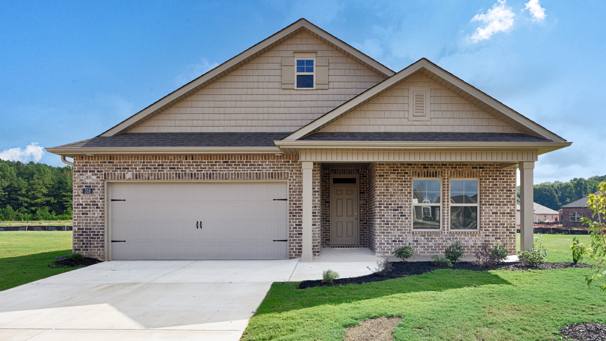 Single story home with brick and two car garage