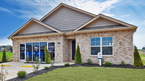 Single story home with brick and two car garage