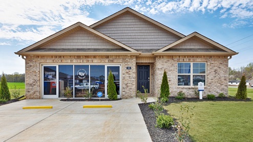 Single story home with brick and two car garage