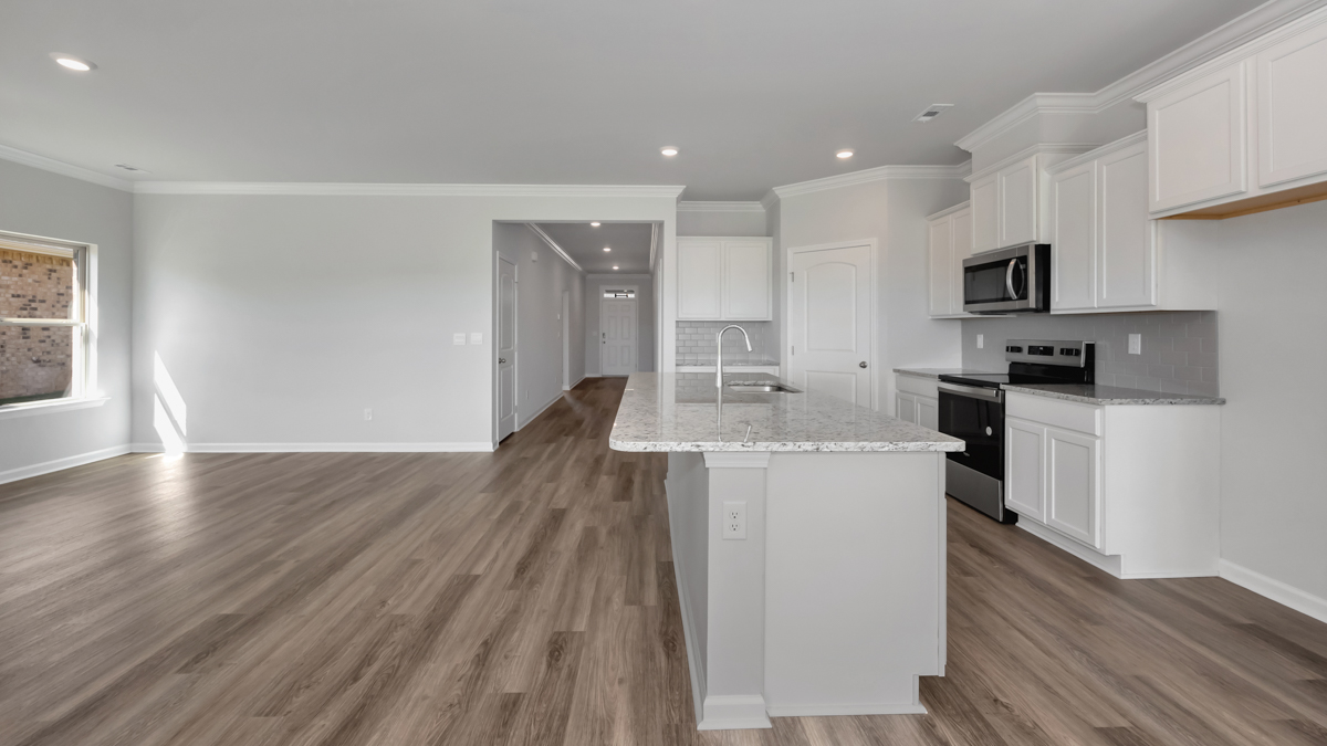 kitchen island with view of the foyer