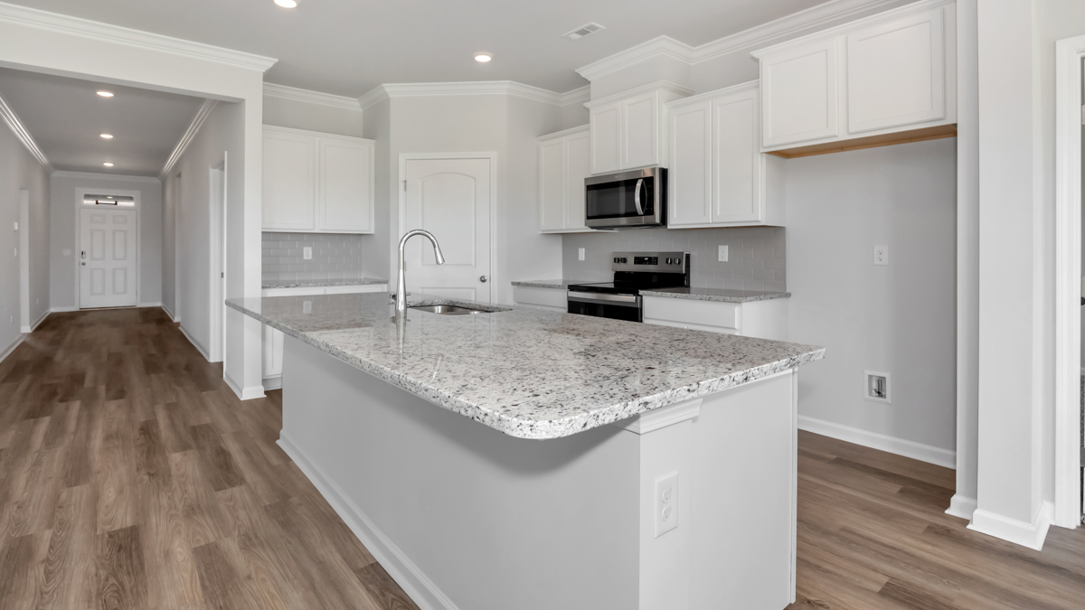 kitchen island with view of the foyer