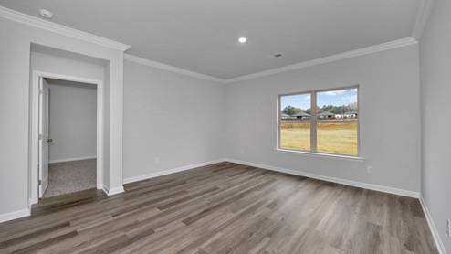 Dining room area with LVP flooring and windows