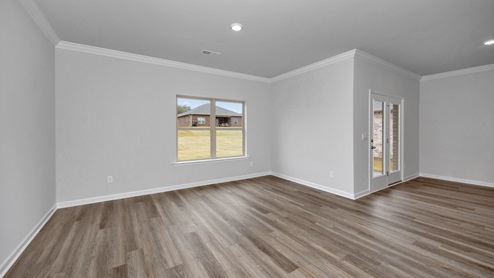 Dining room area with LVP flooring and windows