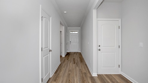 Entry hallway of the home with access to living area