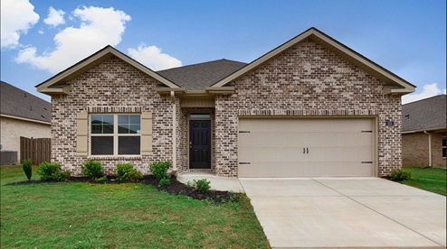 Single story home with brick and two car garage