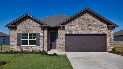 Single story home with brick and two car garage