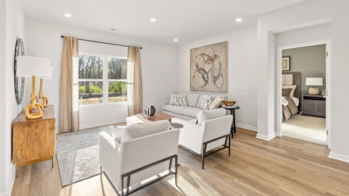 Dining room area with LVP flooring and windows