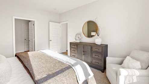 Primary bedroom with carpet
