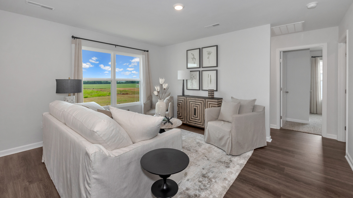 Dining room area with LVP flooring and windows