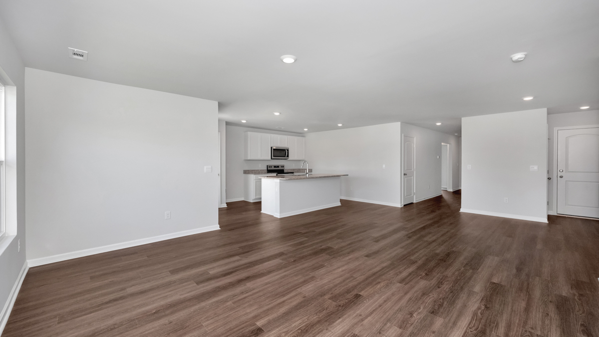 Kitchen island with view of dining / living room area