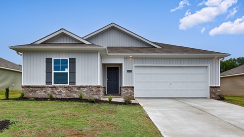 Single story home with vinyl and two car garage