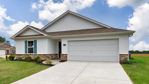 Single story home with vinyl and two car garage