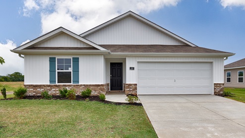 Single story home with vinyl and two car garage