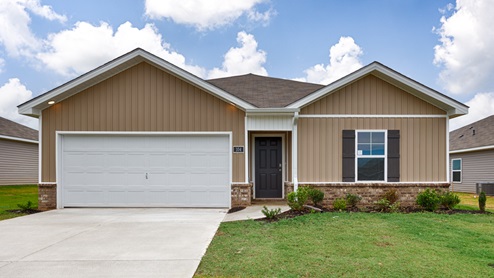 Single story home with vinyl and two car garage