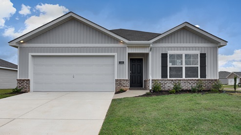 Single story home with vinyl and two car garage