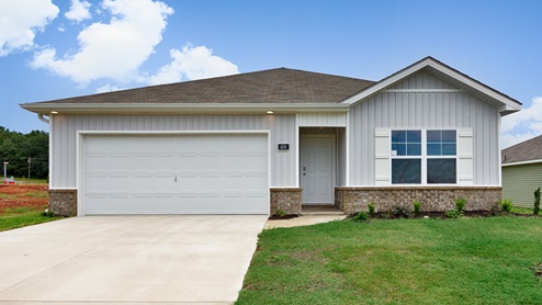 Single story home with vinyl and two car garage