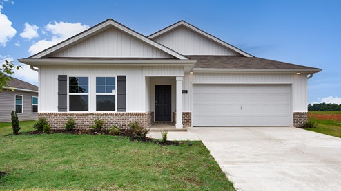 Single story home with vinyl and two car garage