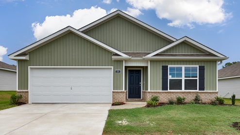Single story home with vinyl and two car garage