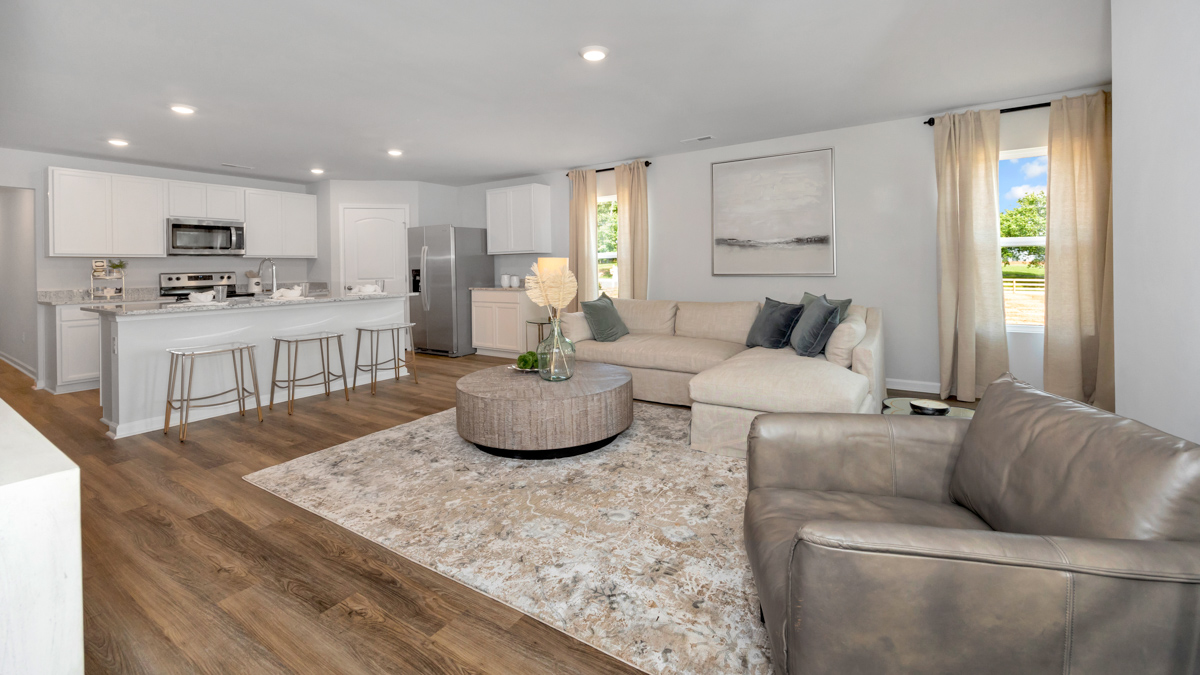 Dining room area with LVP flooring and windows
