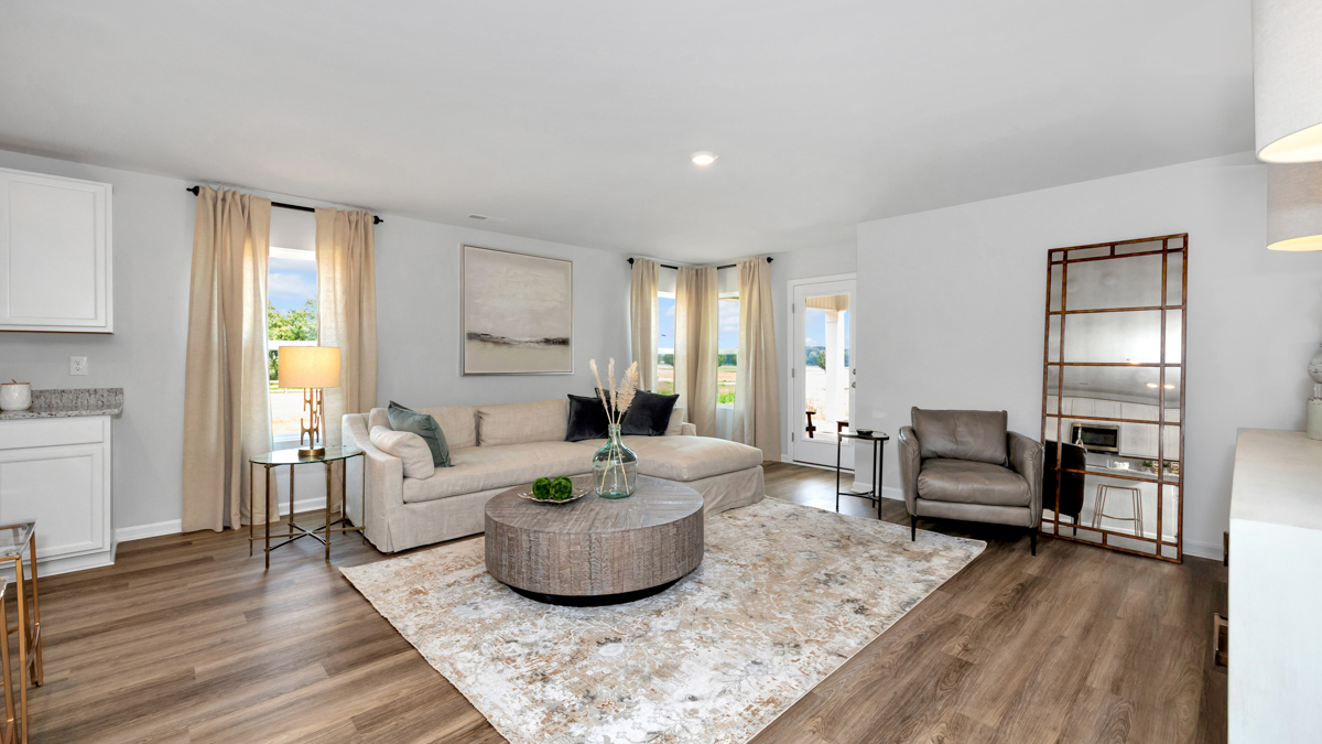 Dining room area with LVP flooring and windows