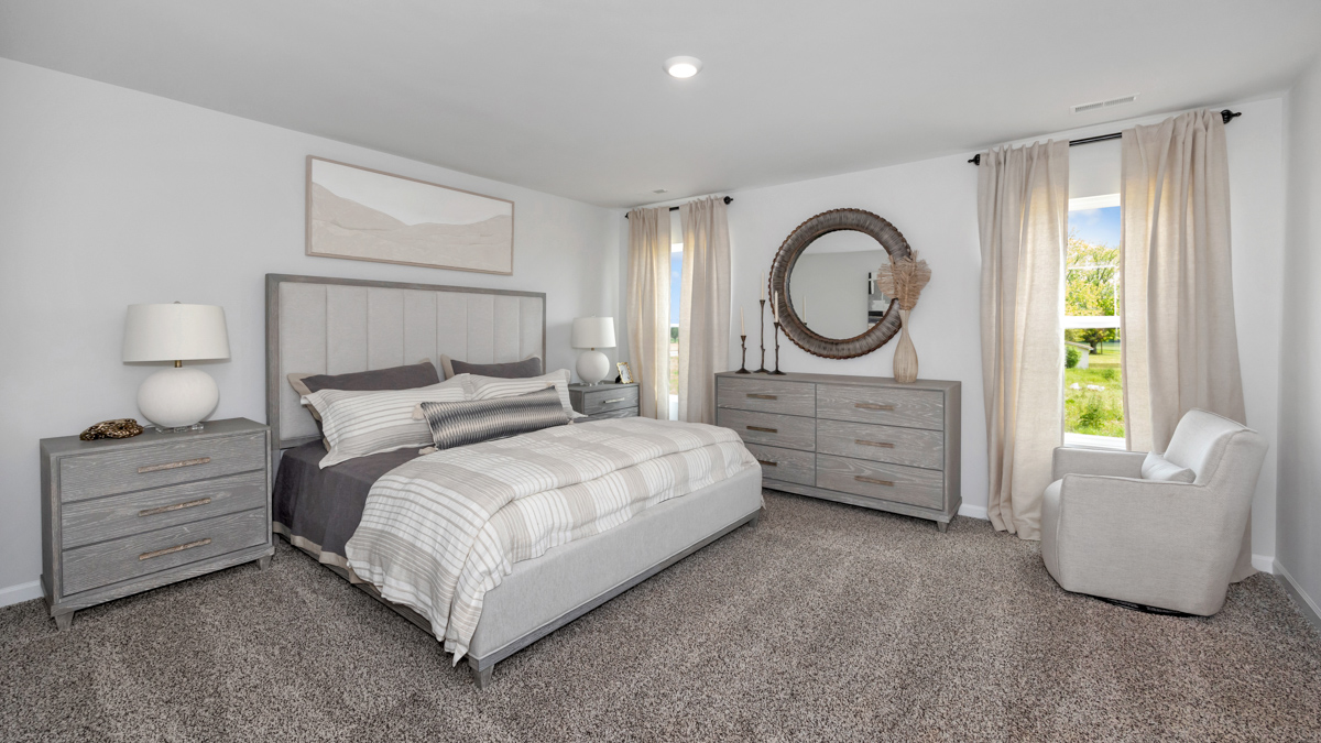 Primary bedroom with carpet