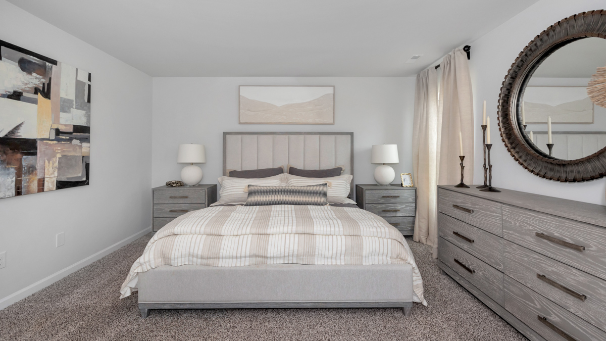 Primary bedroom with carpet
