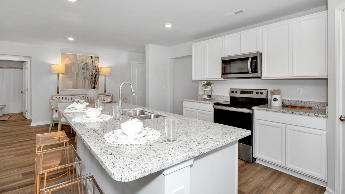 kitchen island with view of the foyer