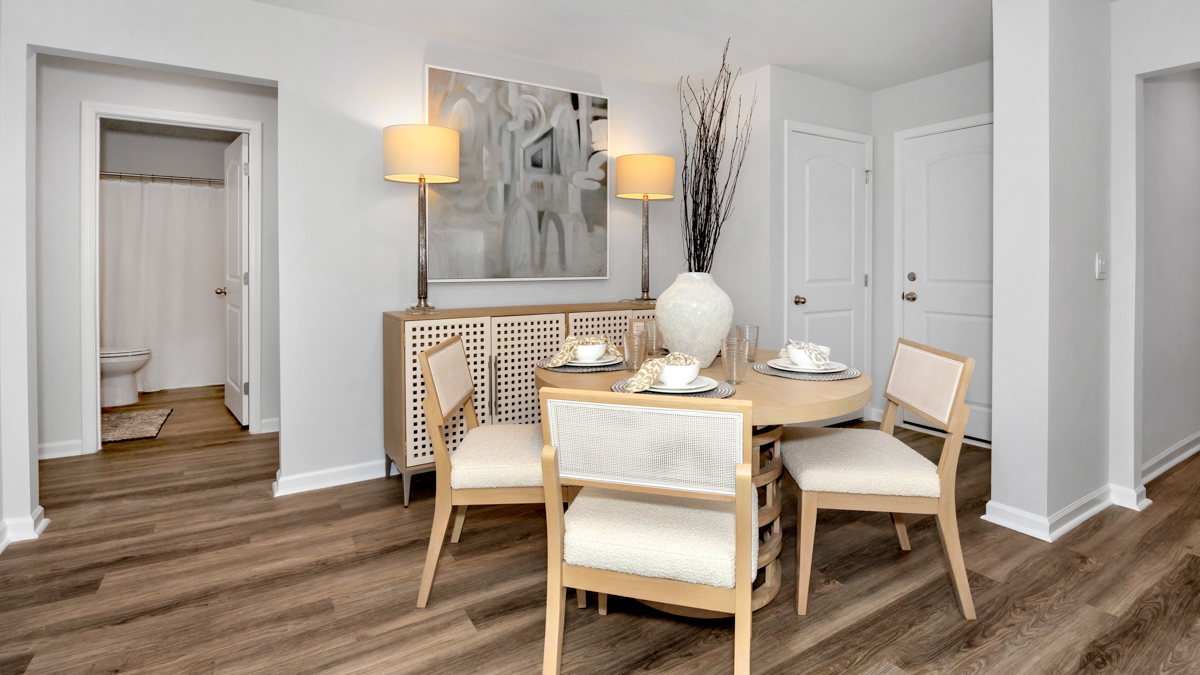 Dining room area with LVP flooring and windows