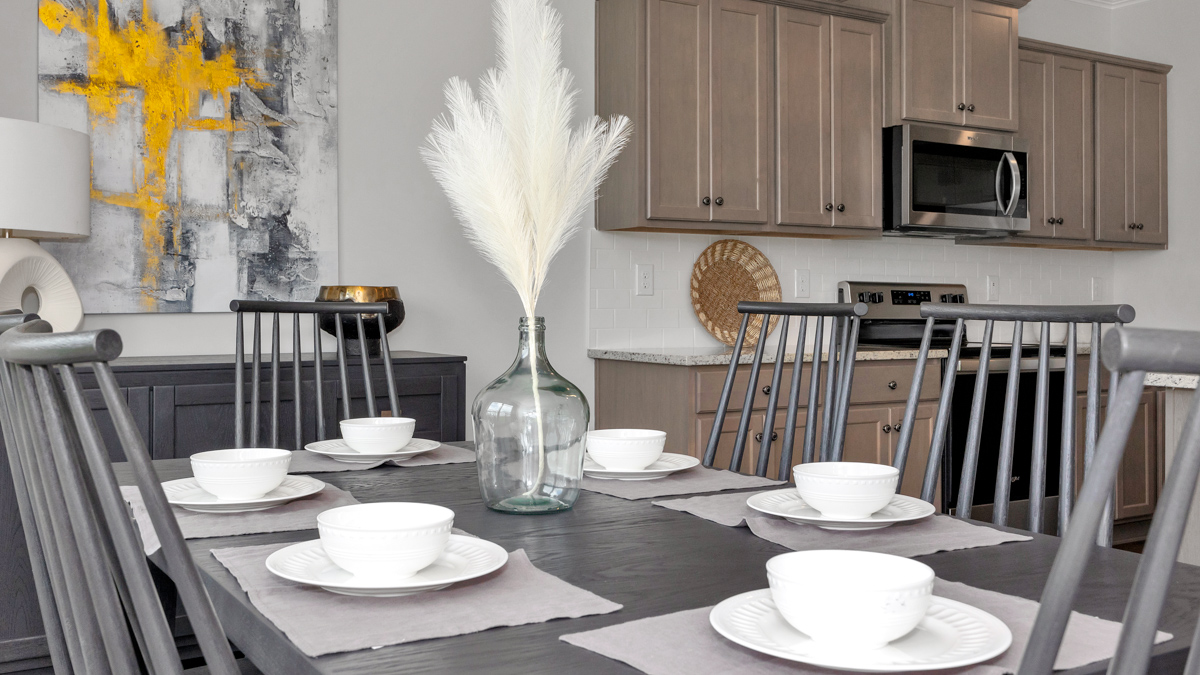 Dining room area with LVP flooring and windows