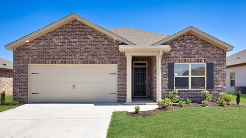 Single story home with brick and two car garage
