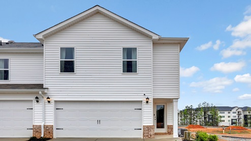 two story townhome with 2 car garage
