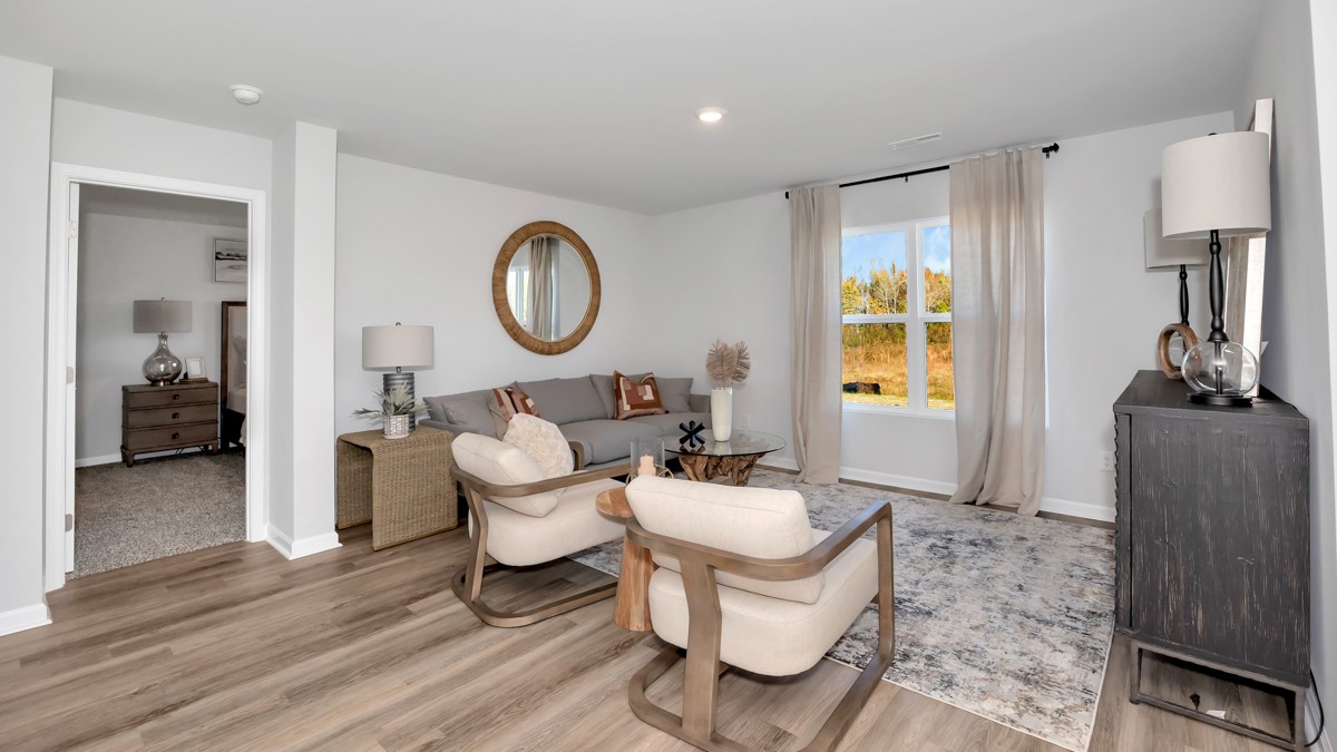 Dining room area with LVP flooring and windows