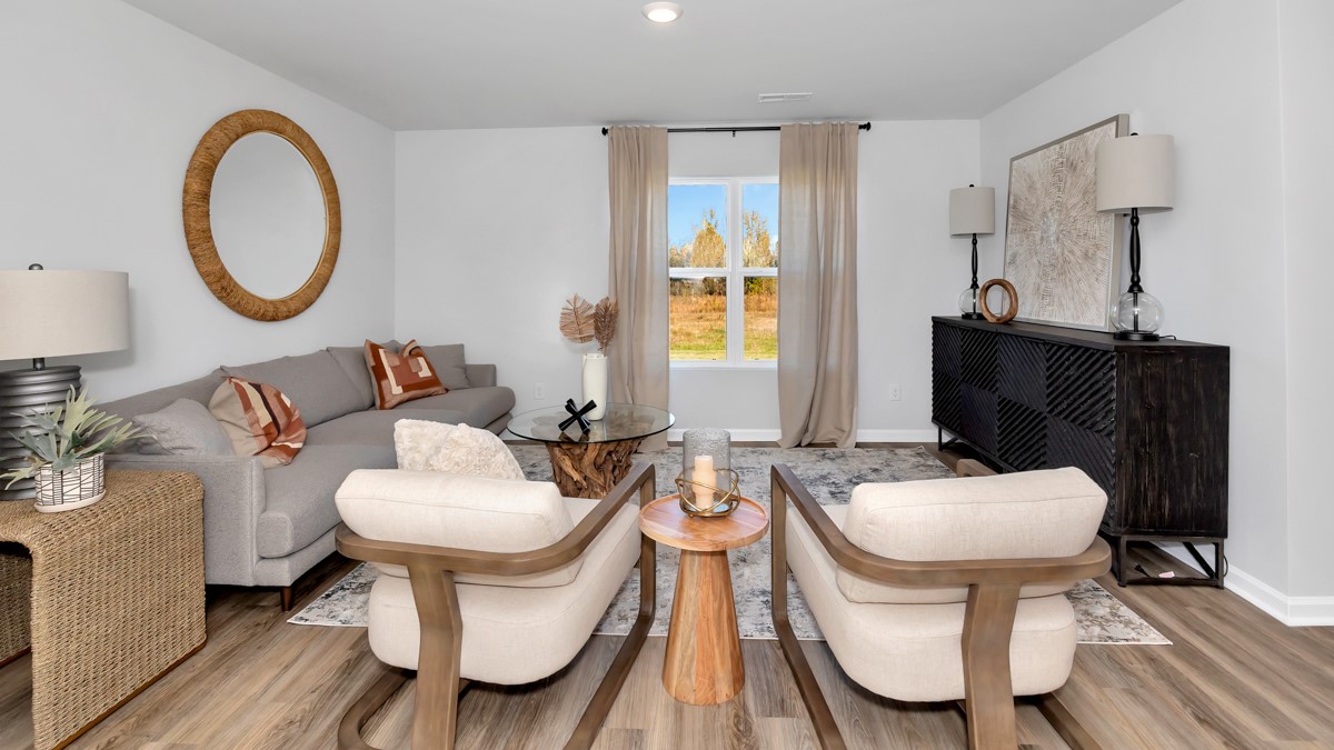 Dining room area with LVP flooring and windows