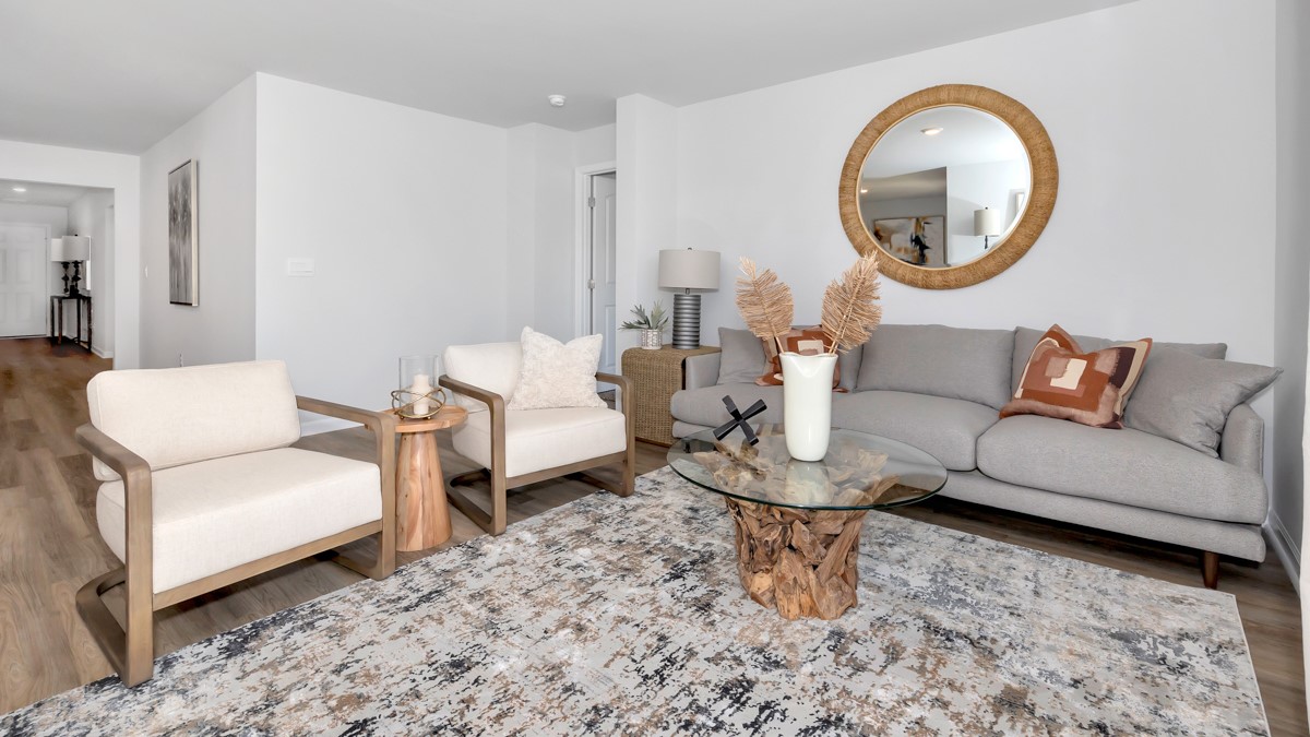 Dining room area with LVP flooring and windows
