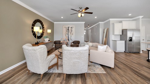 Dining room area with LVP flooring and windows