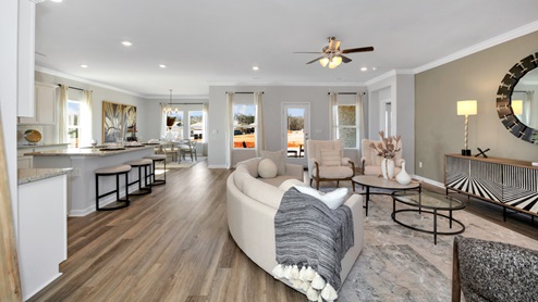Kitchen island with view of dining / living room area