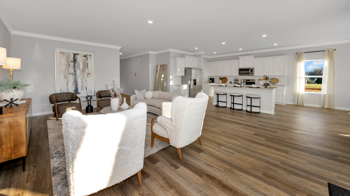 Dining room area with LVP flooring and windows