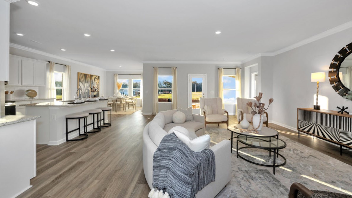 Kitchen island with view of dining / living room area