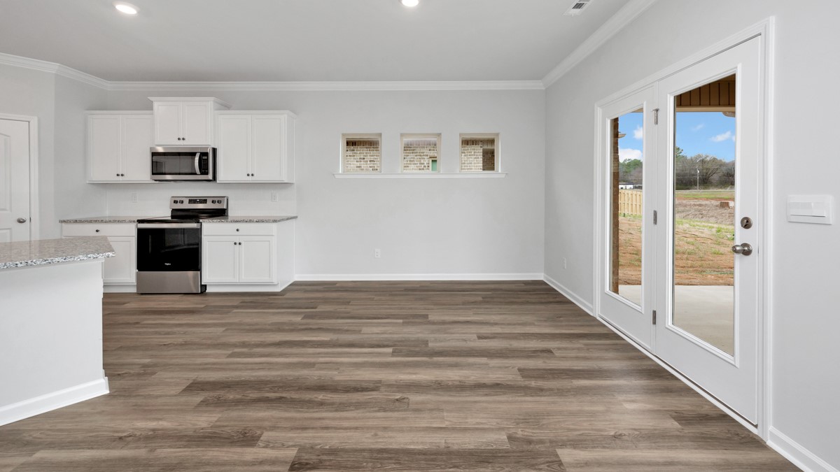 Kitchen island with view of dining / living room area