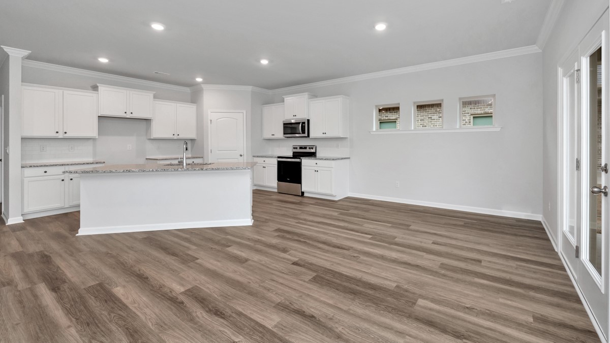 Kitchen island with view of dining / living room area