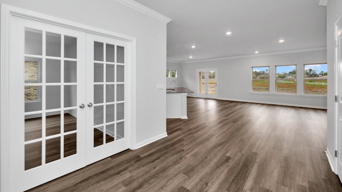 Dining room area with LVP flooring and windows