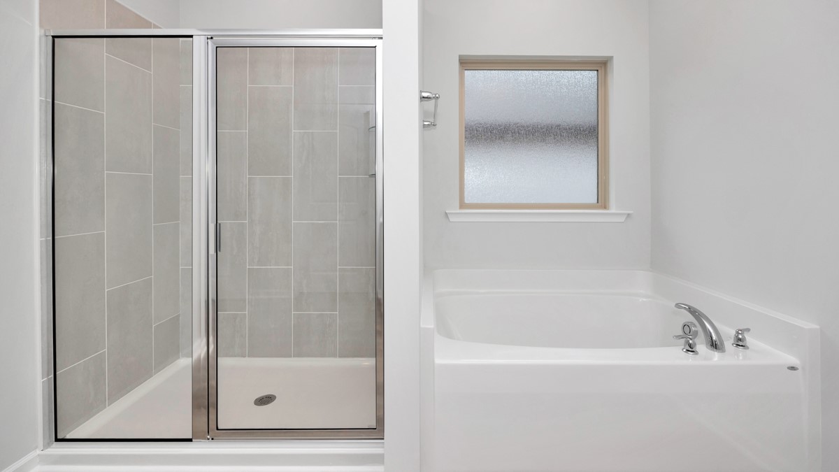 Primary bath with walk in shower and sitting tub