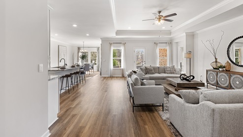 Dining room area with LVP flooring and windows