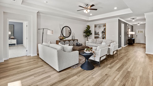Dining room area with LVP flooring and windows