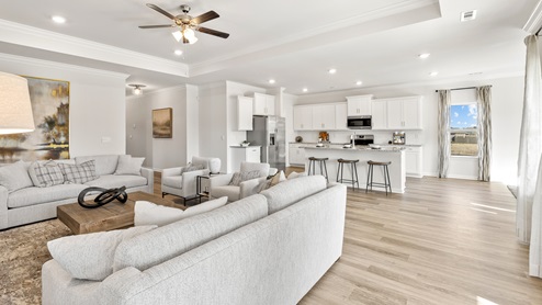 Kitchen island with view of dining / living room area