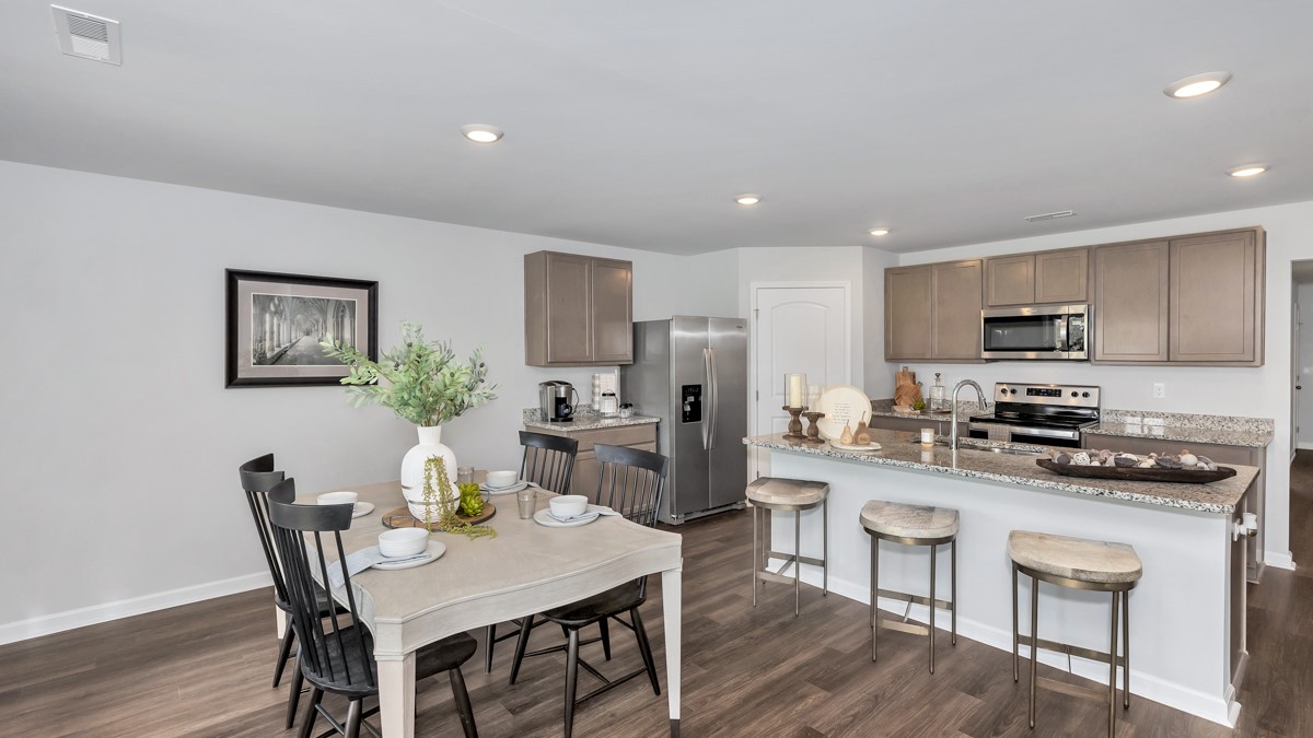 Kitchen island with view of dining / living room area