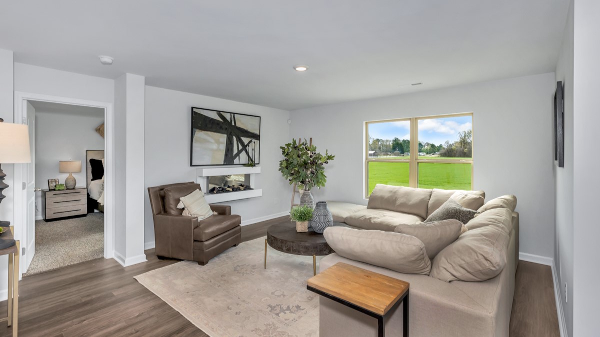 Dining room area with LVP flooring and windows